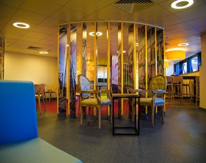 Bespoke slat partition to create zones in break-out room