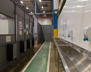 New warehouse employee handwash area with hygienic wall cladding